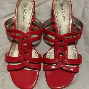 Dark pink (it just looks red) slip-on sandals for women. Size 8